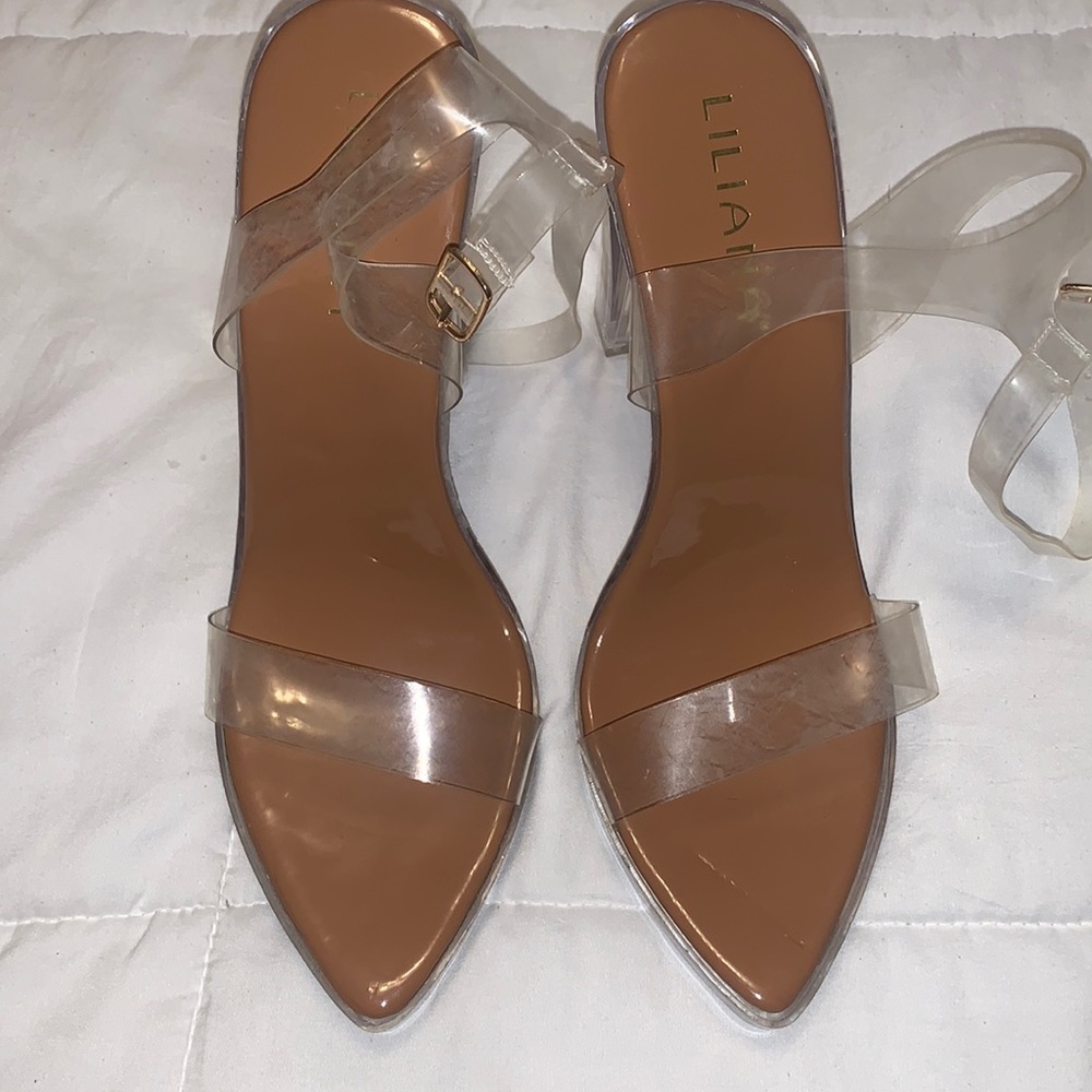 Clear strapped 5 inch heels.